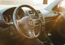 sunlight piercing through Volkswagen steering wheel